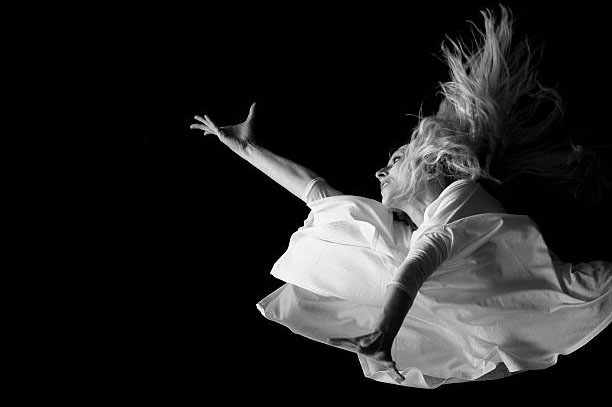 Beautiful young blonde balerina dances